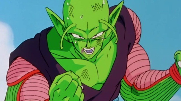 Um personagem de desenho animado com um copo verde que diz dragon ball super  nele.