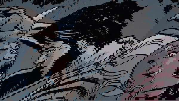 Ororo tendo um ataque de pânico e Wolverine a ajudando